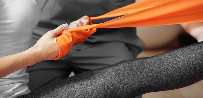 patient receiving therapeutic exercise for auto accident injury treatment in Sherman