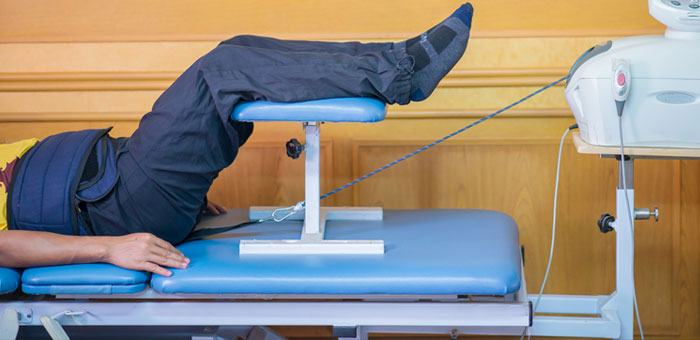 patient receiving traction therapy in Sherman for auto accident injury recovery